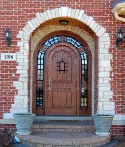 arched top rustic alder door in chicago